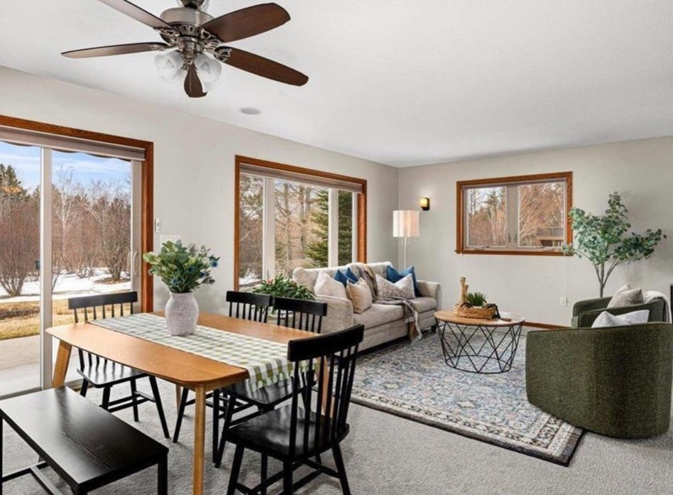 A clean and organized open-concept living and dining room area, expertly cleaned by Tidy Details in Duluth, MN.