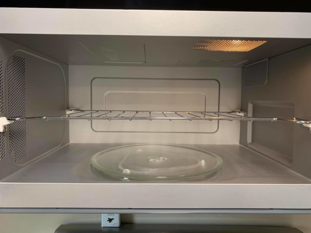 The sparkling clean interior of a microwave oven after professional cleaning by Quality Cleaning in Summerville, SC.