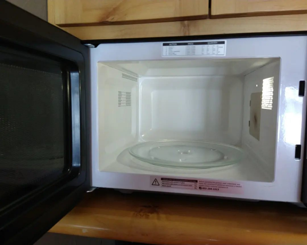 A sparkling clean microwave interior, showcasing the detailed work by Sunrise Cleaning in Saint Petersburg, FL.