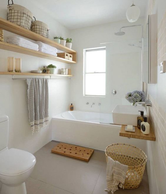 A clean and organized modern bathroom, showcasing the results of house cleaning by Cleaning with Lisseth in Madison, WI.