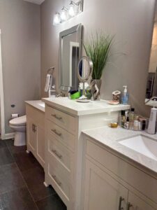A pristine modern bathroom with a stylish double vanity, showcasing the high-quality cleaning from Estela's Cleaning Service's in Lake Elmo, MN.