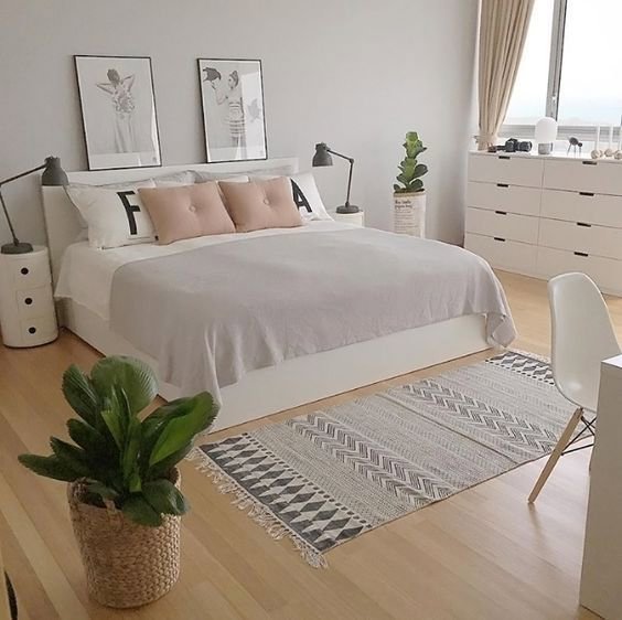 A clean and tidy modern bedroom, showcasing the results of house cleaning by Cleaning with Lisseth in Madison, WI.