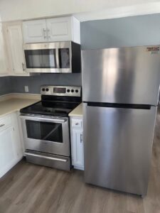 A clean and modern kitchen with stainless steel appliances after professional cleaning by Hm General Cleaning Services in Schenectady, NY