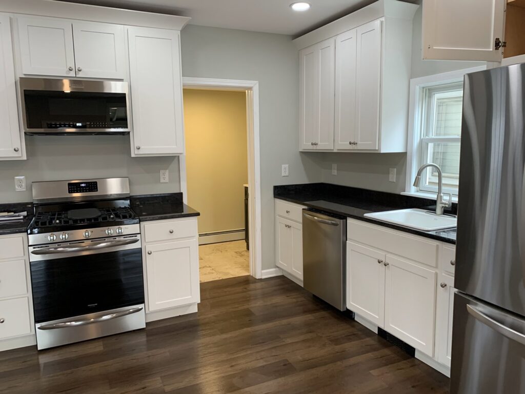 A clean and modern kitchen after a professional house cleaning service by Cuse Cleaning in Syracuse, NY.