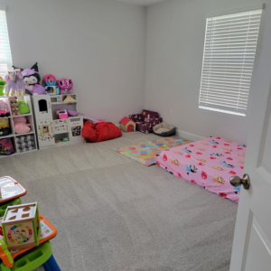 A clean and organized children's room, showcasing professional house cleaning results by Magic House Cleaning in Fayetteville, NC.