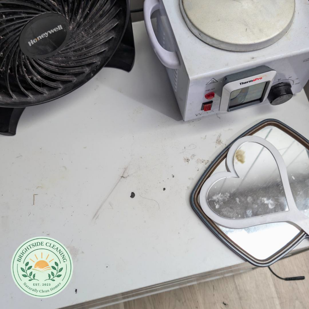 A clean and organized white table surface, demonstrating the thorough cleaning services provided by Maid by Lauren Cleaning Services in Fayetteville, AR.