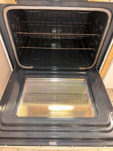 A sparkling clean oven interior after professional deep cleaning by We Maid It Two Cleaning Services LLC in Owensboro, KY.