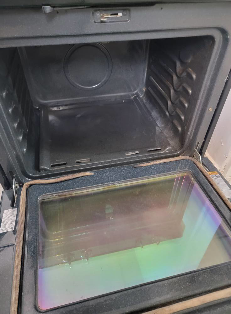 A perfectly clean oven interior and glass door after professional cleaning by Windham Cleaning in Akron, OH.