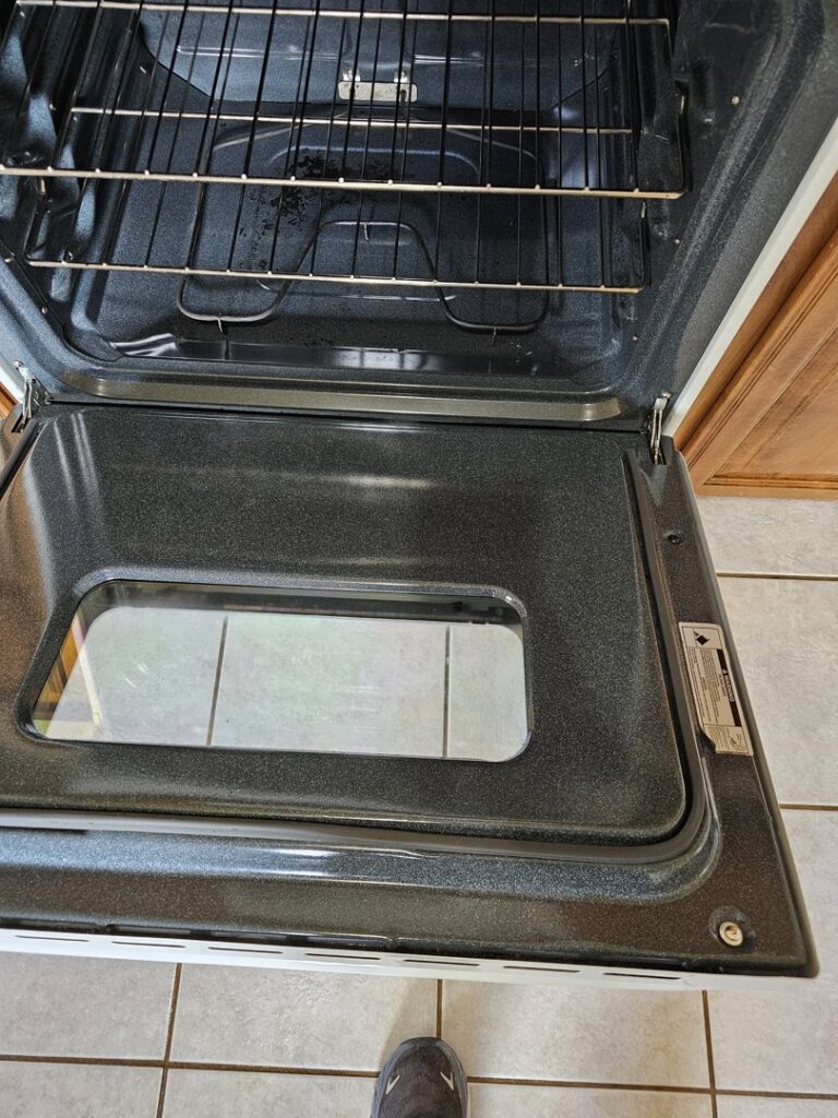 The sparkling clean interior of an oven, showcasing deep cleaning services by Clara's Cleaning LLC in Oklahoma City, OK.