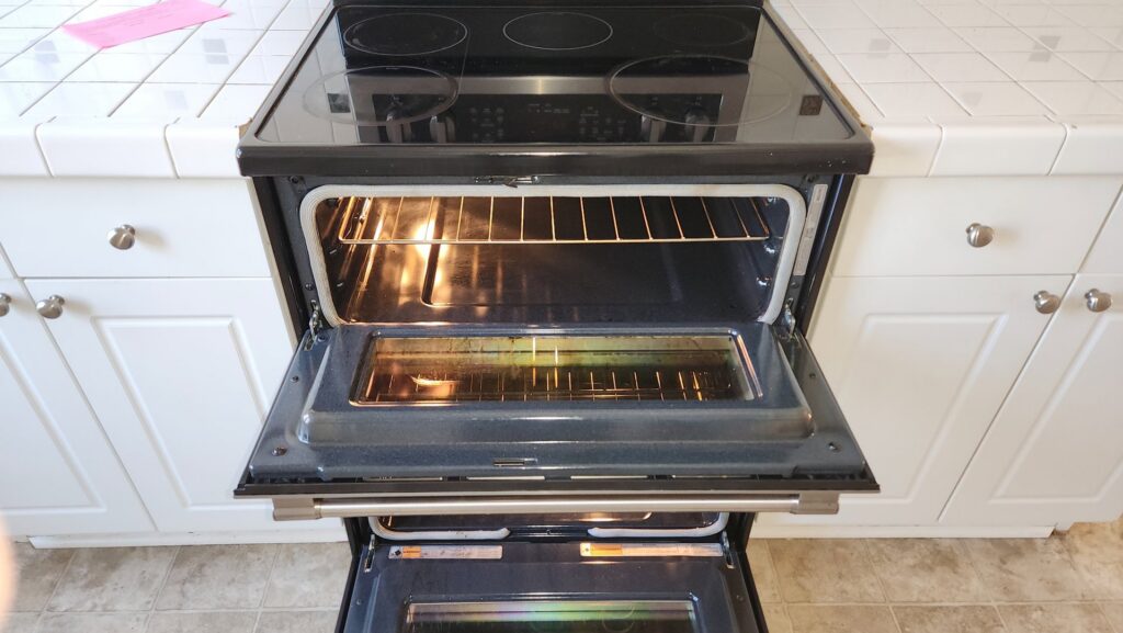 A sparkling clean oven interior, showcasing the deep kitchen cleaning services offered by Eyedeal Cleaning Services in Gresham, OR.