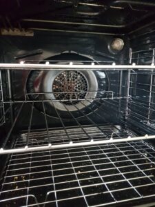 A sparkling clean oven interior with polished racks, showcasing professional oven cleaning by Pretty & Polished Cleaning Services in Sandy, OR.