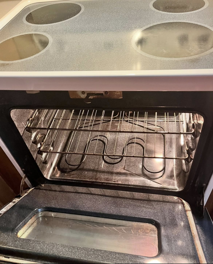 A sparkling clean oven after a professional deep cleaning by Mama's Touch Cleaning Service LLC in Evansville, IN.