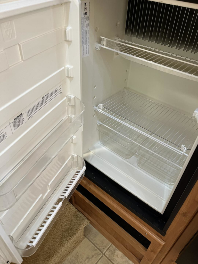 A sparkling clean refrigerator interior after a professional cleaning service by You have it maid in Canton, MI.