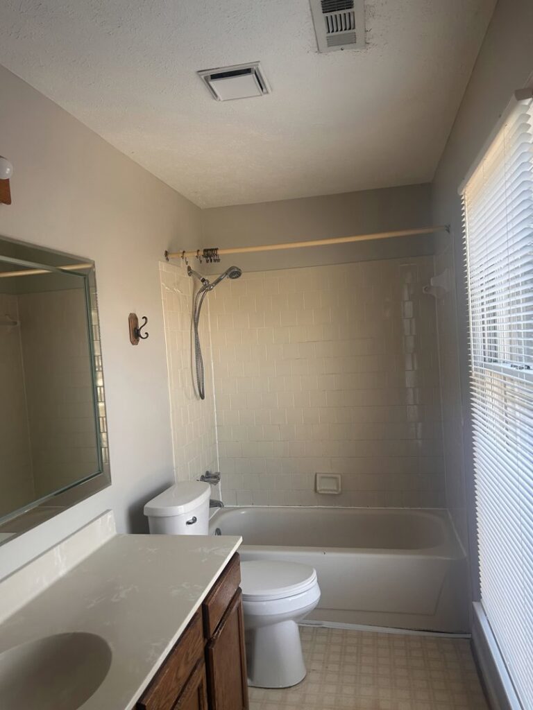 A clean and tidy residential bathroom, showcasing house cleaning services by Time To Shine Cleaning Services in Round Rock, TX.