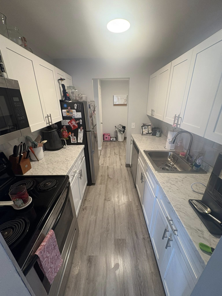 A sparkling clean residential kitchen, showcasing the quality house cleaning services by Cleaning with Kay in Syracuse, NY.
