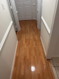A clean and shiny hallway floor, demonstrating house cleaning services by Time To Shine Cleaning Services in Round Rock, TX.