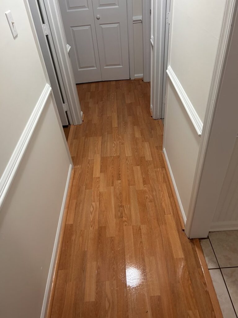A clean and shiny hallway floor, demonstrating house cleaning services by Time To Shine Cleaning Services in Round Rock, TX.