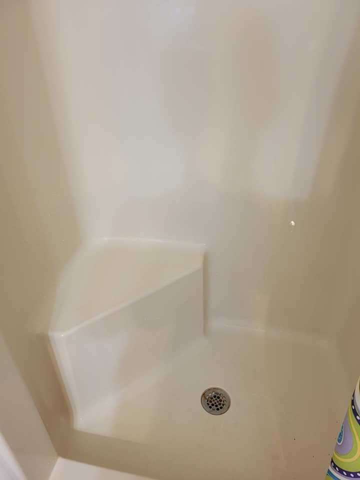 A sparkling clean shower stall after professional cleaning by Busy B's Cleaning LLC in Norfolk, VA.