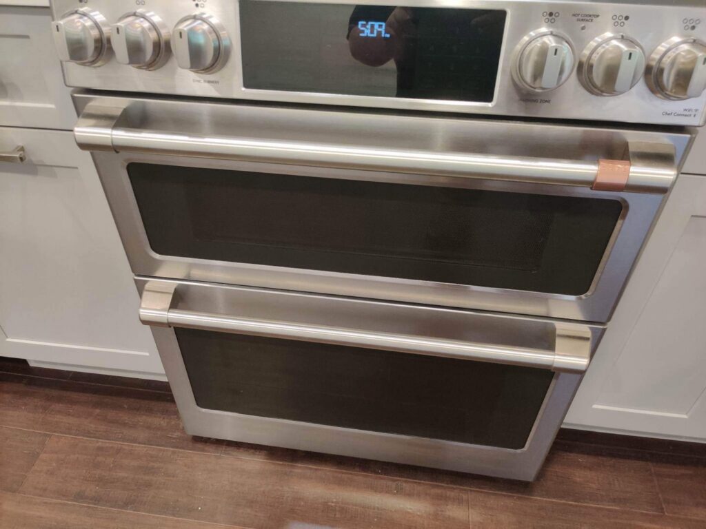 A clean and polished stainless steel double oven after cleaning by Rebeccas Customized Cleaning LLC in Reading, PA.