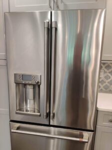 A clean and polished stainless steel refrigerator after cleaning by Rebeccas Customized Cleaning LLC in Reading, PA.