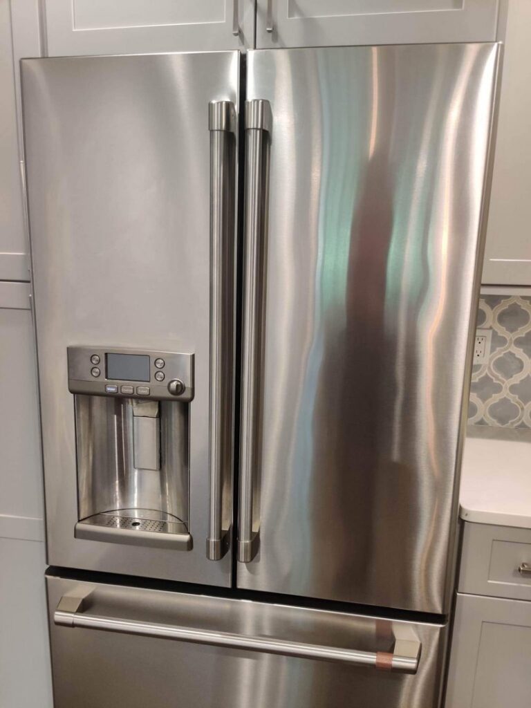 A clean and polished stainless steel refrigerator after cleaning by Rebeccas Customized Cleaning LLC in Reading, PA.