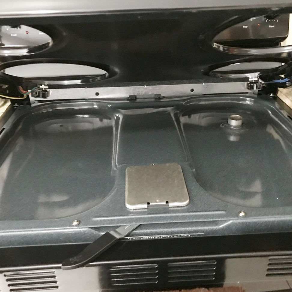 A sparkling clean stove top after professional cleaning by Lourdes Home Cleaning in East Hampton, NY.