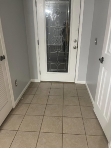 A clean tile floor in an entryway, reflecting the professional house cleaning services by The Clean Solution in Eagle Lake, TX