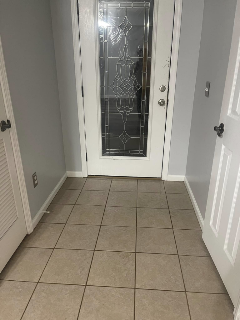 A clean tile floor in an entryway, reflecting the professional house cleaning services by The Clean Solution in Eagle Lake, TX