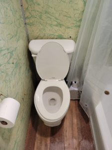 A freshly cleaned toilet, sparkling white after professional service from Rachel's Residential Cleaning in Chino Valley, AZ.