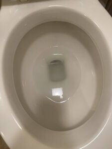 A sparkling clean toilet bowl, showcasing the excellent results of house cleaning services by Jolley Services, INC in Bossier City, LA.