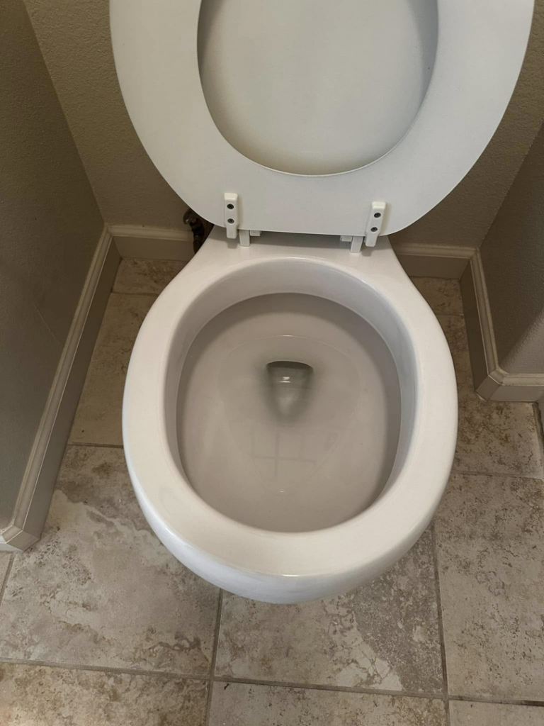 A spotless toilet bowl after thorough house cleaning by A.M.L Janitorial Services LLC in Sparks, NV.