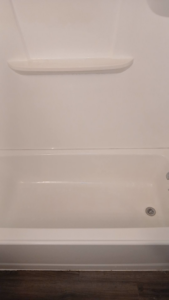 A sparkling clean white bathtub, showcasing the quality house cleaning services by On Point Cleaning Authority in Dayton, OH.