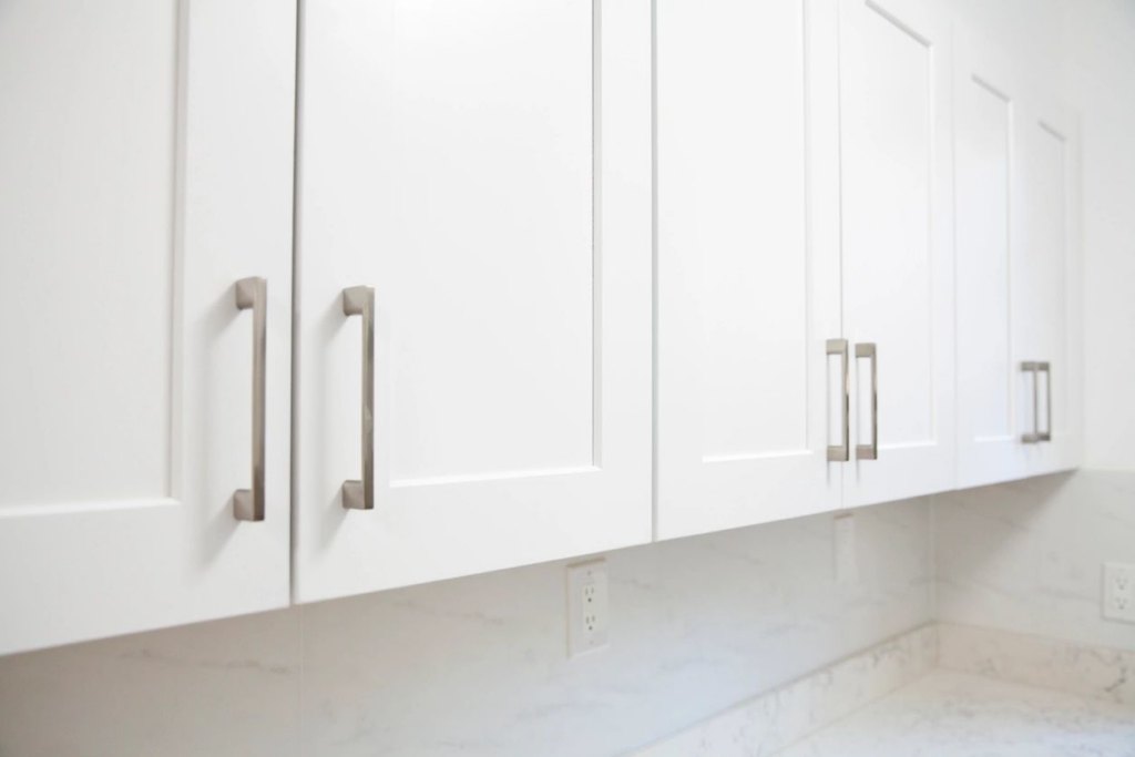 Bright and clean white kitchen cabinets and countertop, maintained by S&R Services LLC in Anchorage, AK.