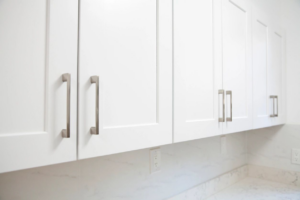Bright and clean white kitchen cabinets and countertop, maintained by S&R Services LLC in Anchorage, AK.
