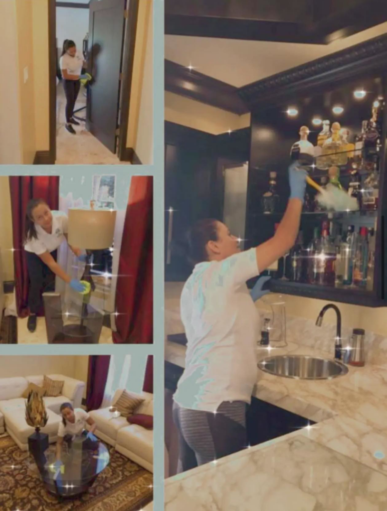 A professional cleaner dusting a bar area and cleaning a lamp for First Class Commercial and Residential Cleaning Services in Charlotte, NC.