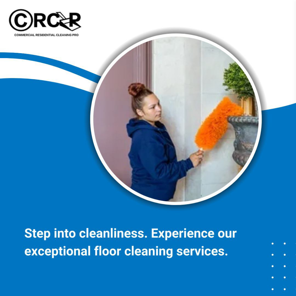 A house cleaner dusting a decorative urn with an orange duster for Commercial And Residential Cleaning Pro in Albany, NY.