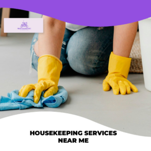 A cleaner wearing yellow gloves scrubbing a floor by hand with a cloth for Hightower Private Housekeeping in Henderson, NV.