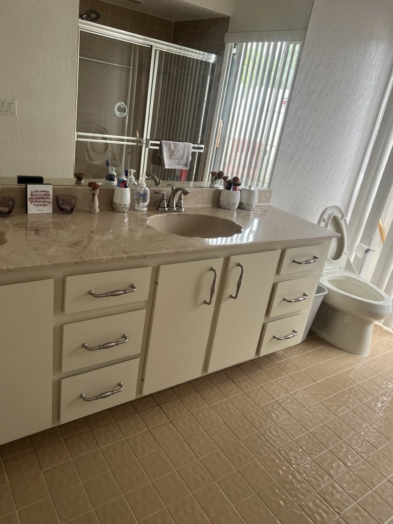 A professional cleaning cart fully stocked with supplies for KPG cleaning care in Fort Lauderdale, FL