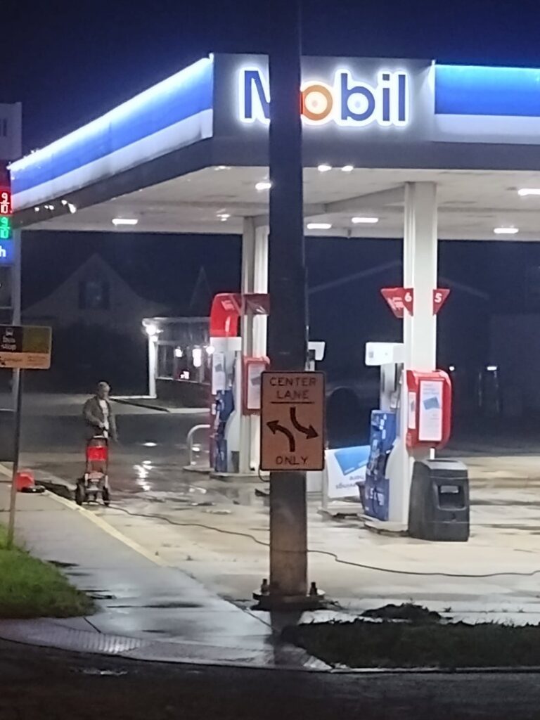 Various cleaning equipment, including a pressure washer, stored in a vehicle for Satisfaction Cleaning in Athens, AL.