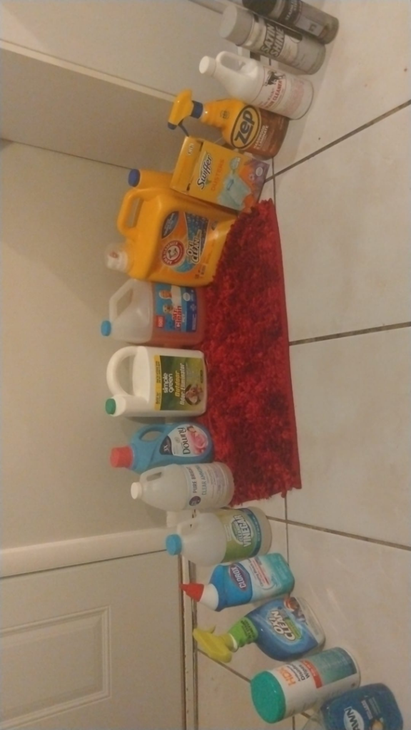 Various cleaning products and supplies used by Perfection Cleaning for house cleaning services in Kansas City, MO.
