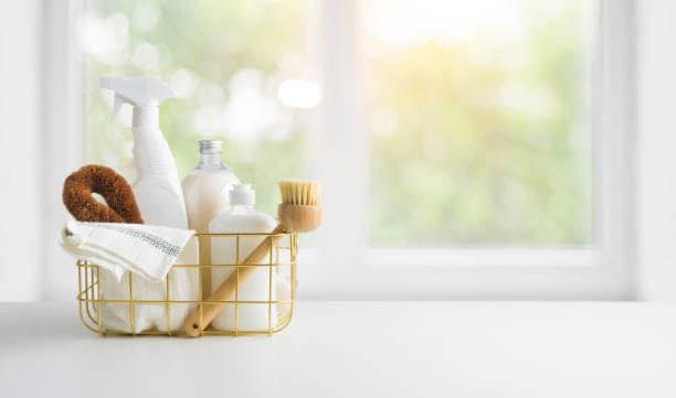 A basket filled with cleaning supplies for Amanda Guazzoni's Cleaning Service in Barre, VT.