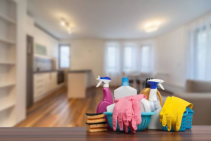 A collection of cleaning supplies and gloves ready for house cleaning by Grant Cleaning in Missoula, MT.