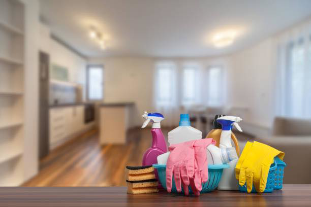 A collection of cleaning supplies and gloves ready for house cleaning by Grant Cleaning in Missoula, MT.
