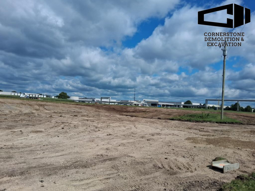 A large area of cleared land ready for development, prepared by Cornerstone Demolition & Excavation in Lexington, KY