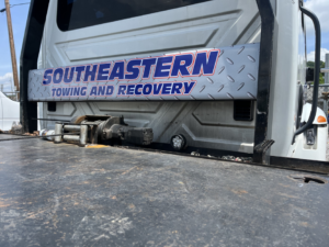 Close-up of a tow truck's winch and flatbed equipment at Southeastern Towing Inc. in Chattanooga, TN.