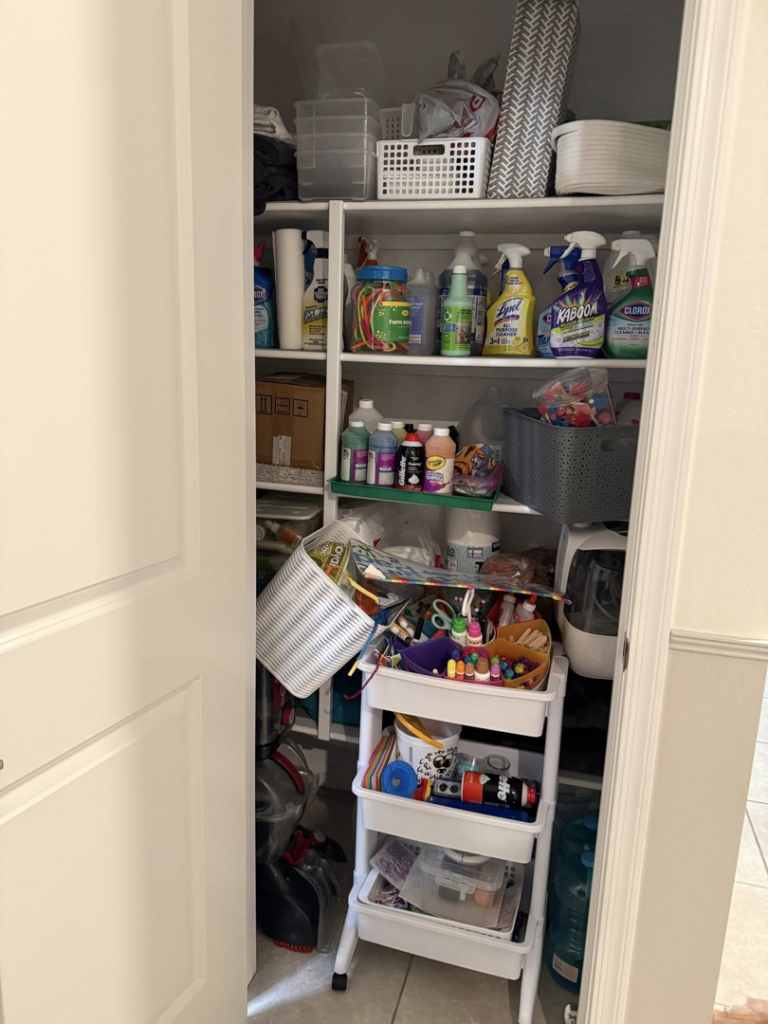 A cluttered pantry closet before professional cleaning and organization by ClutterGone in Surprise, AZ.
