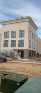 Commercial building under construction with stucco, EIFS, and brick siding by Eastern Stucco Restorations in Rock Hill, SC.