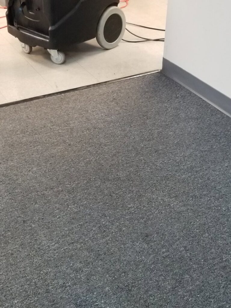 A commercial carpet cleaning machine in use by Cooper-N-Folks in Philadelphia, PA