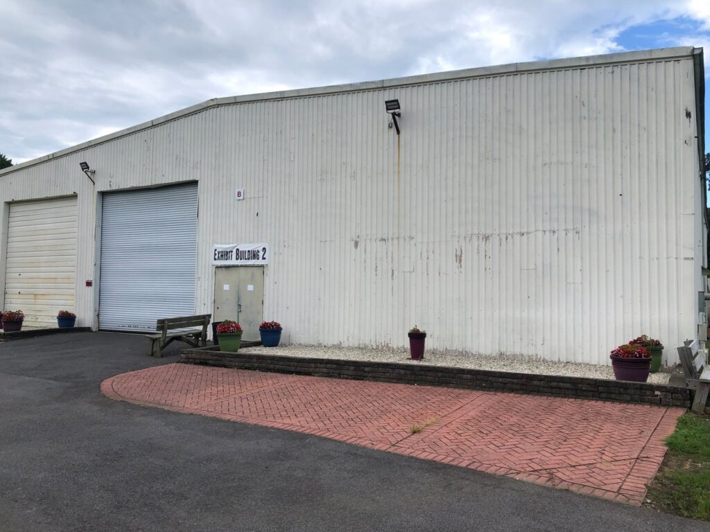 Commercial corrugated metal siding on an industrial building by Annapolis Painting Services Inc in Annapolis, MD