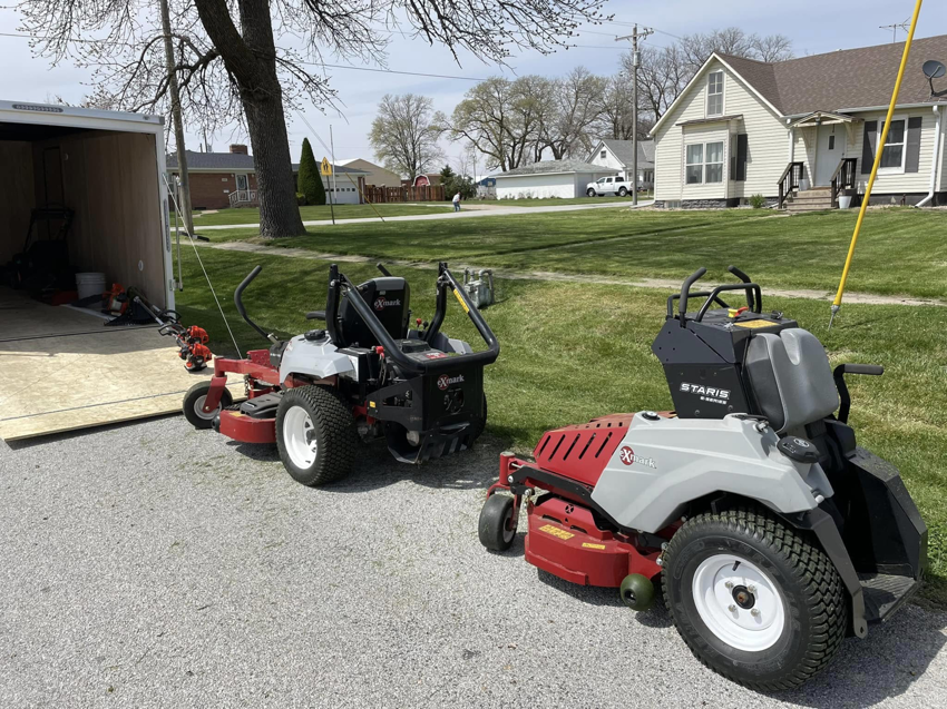 Two commercial riding lawn mowers ready for service by Winter/Green Solutions LLC in Kearney, NE.